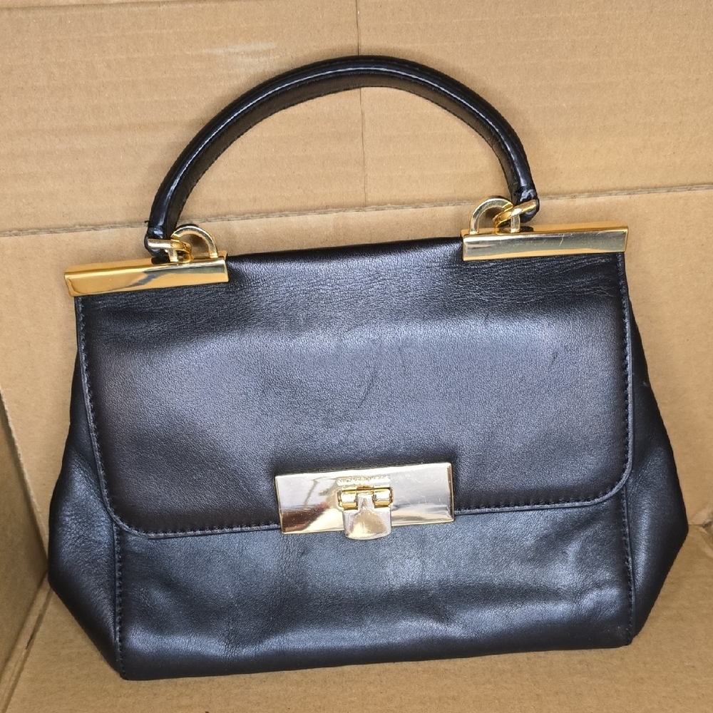 Michael Kors Black and Gold Satchel with Vintage-Inspired Silhouette